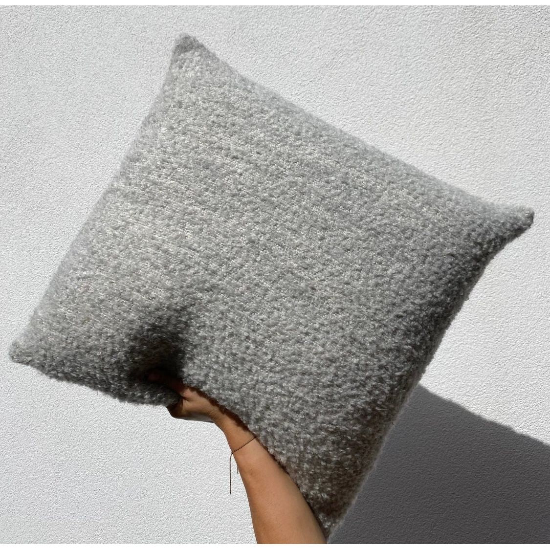 Scapa_home_cushion_alpone_boucle grey_in_hand